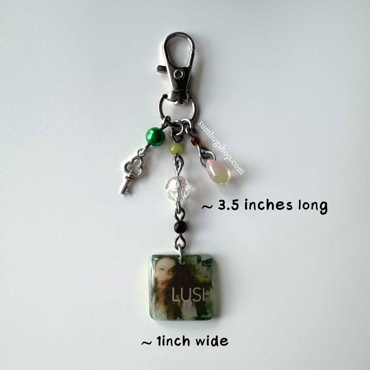 "Lush" album keychain